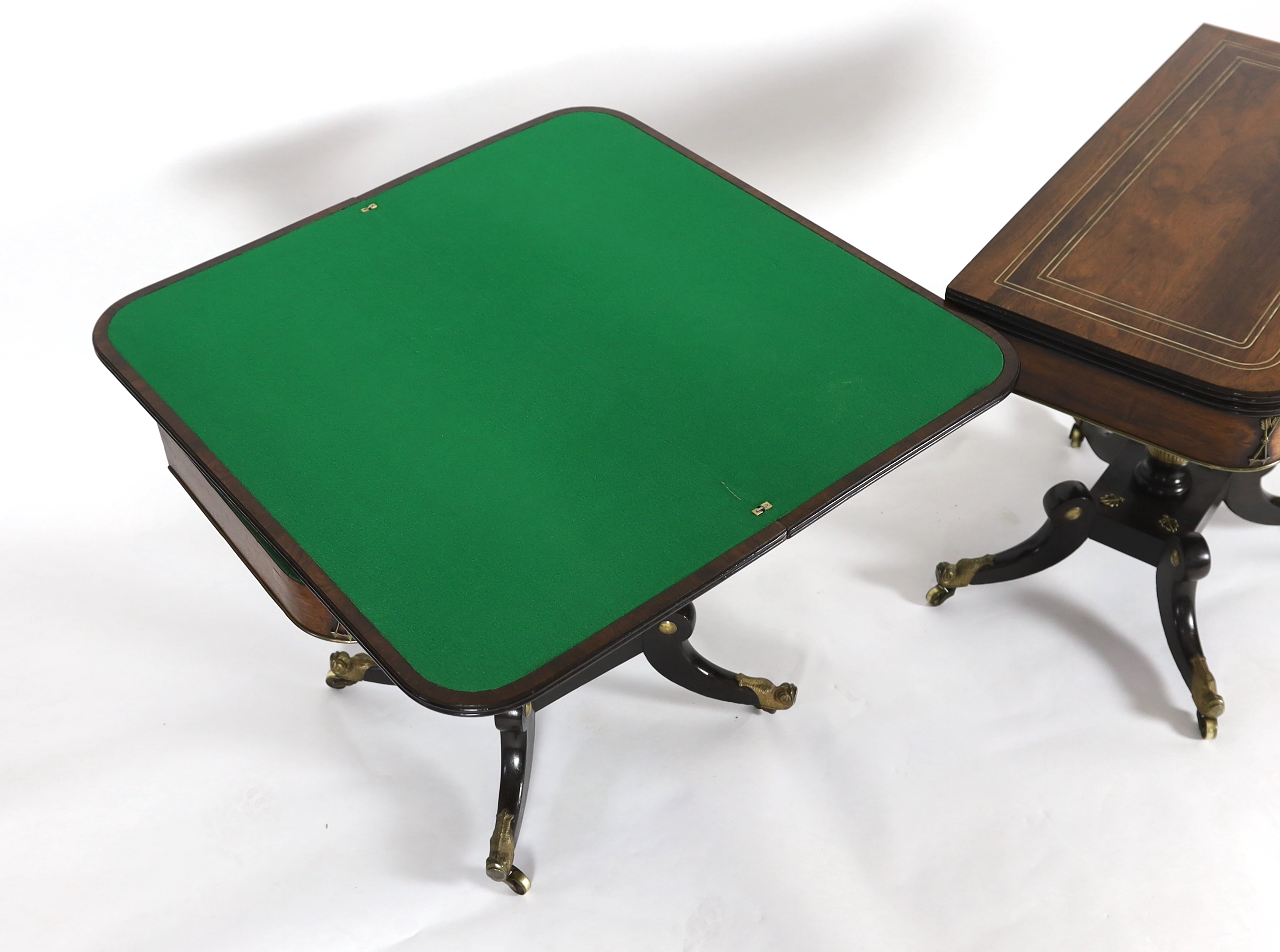 A pair of Regency brass inset rosewood and ebonised card tables 91cm wide, 45cm deep, 75cm high